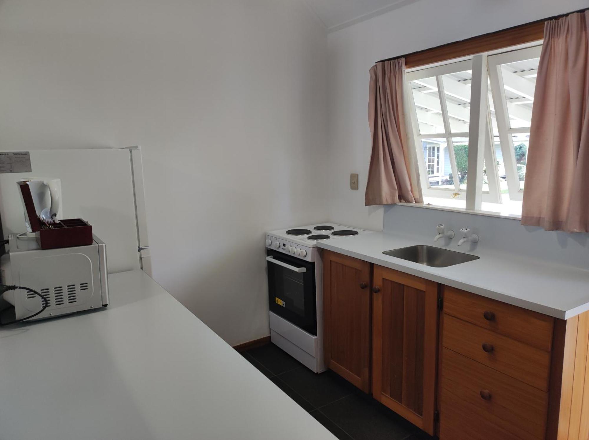 Huka Falls Resort Taupo Exterior foto A kitchen in a student flat
